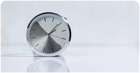 A modern-looking alarm clock symbolizing efficient deadline tracking.