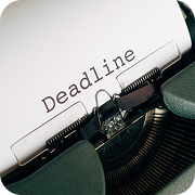 Vintage typewriter with "Deadline" typed on paper, emphasizing strict deadlines for projects.